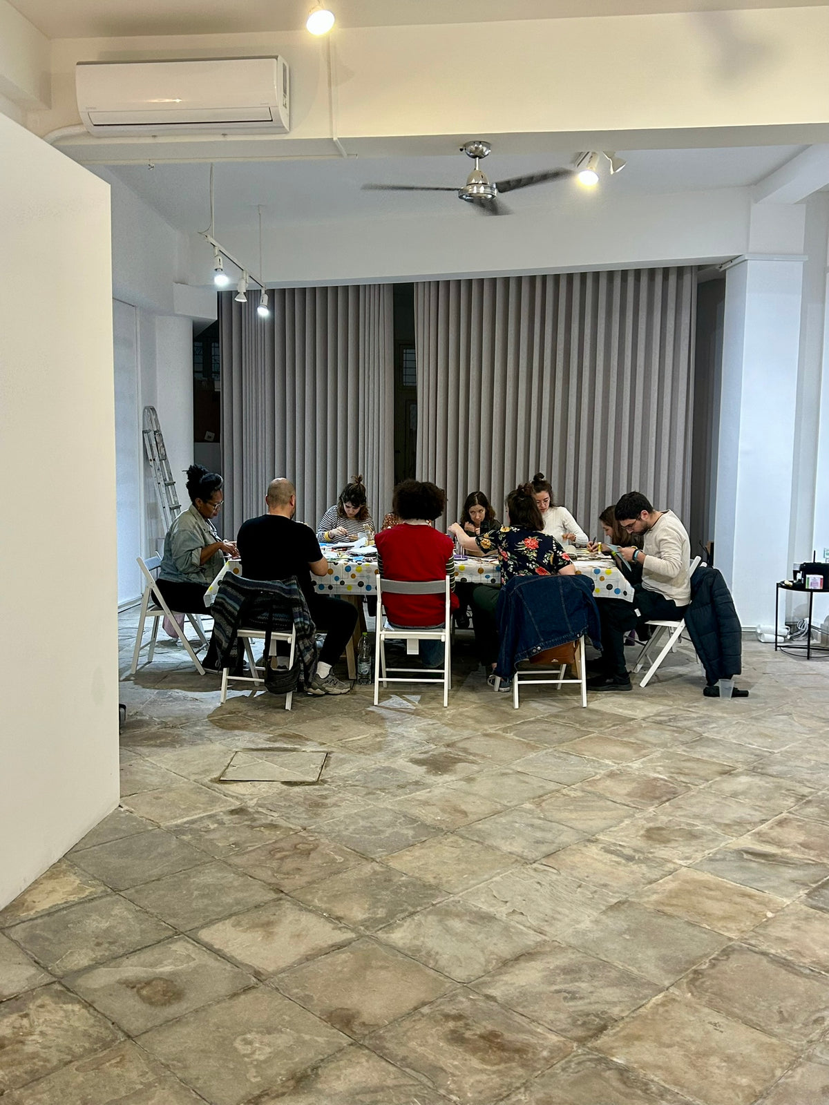 Colourful materials and reflection prompts at an UNDO Circle